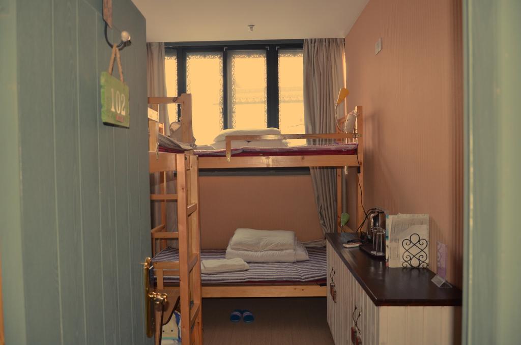 Snail Youth Hostel Huzhou Habitación foto